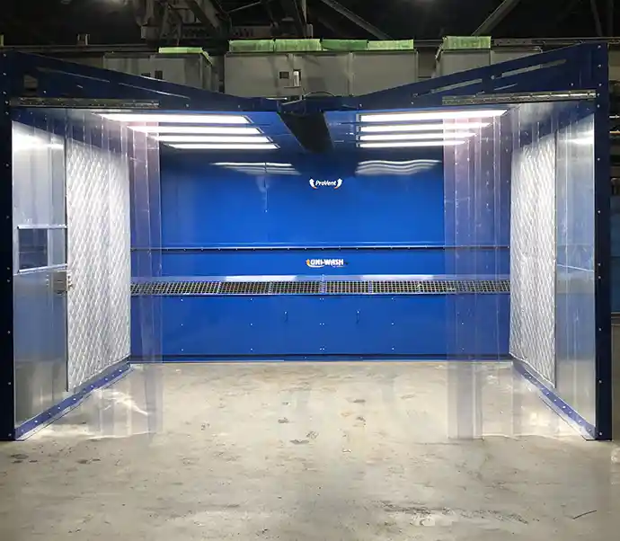 Blue painted booth with clear plastic and LED lighting
