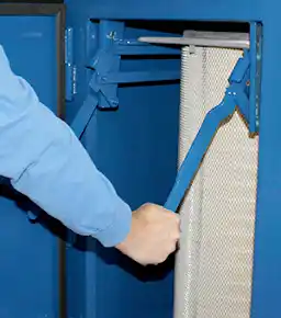 Cam-Loc filter seal being actuated and locing the cartridge filters into place